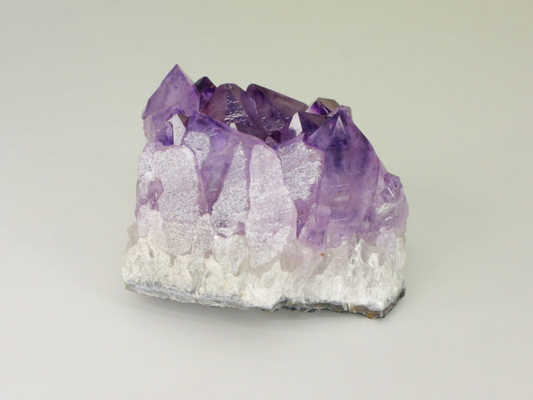 Beautiful Amethyst cluster with inclusions. Back view