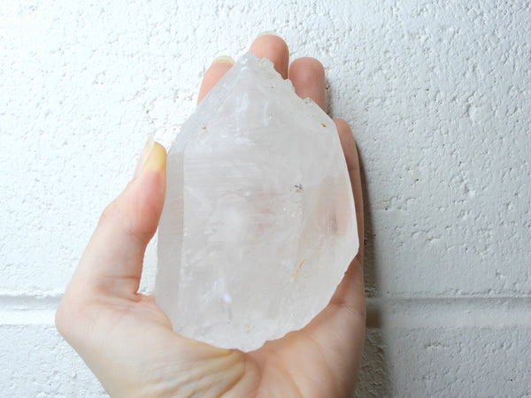 Himalayan Clear Quartz natural point in someone's hand