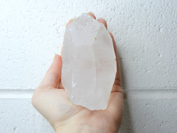 Himalayan Clear Quartz natural point in someone's hand