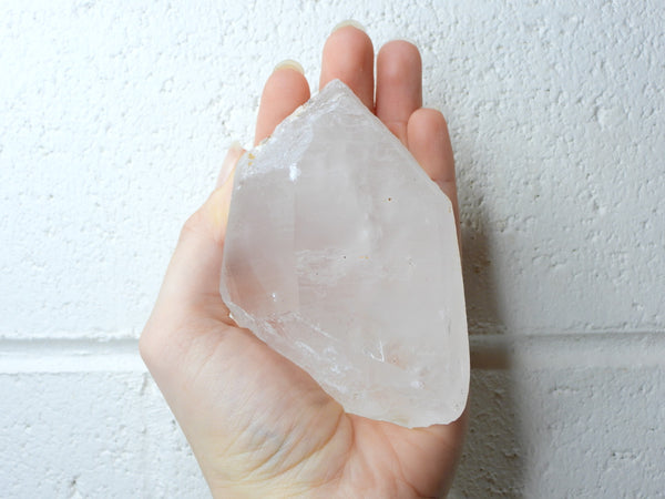 Himalayan Clear Quartz natural point in someone's hand