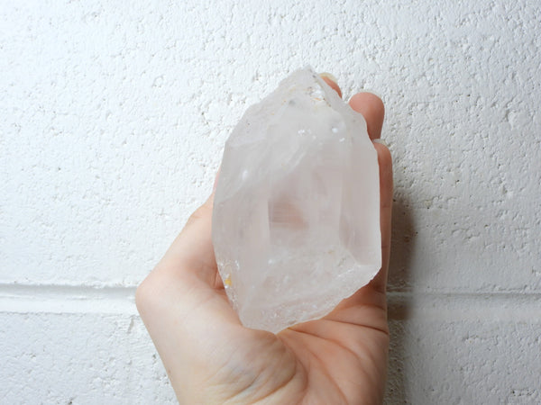 Himalayan Clear Quartz natural point in someone's hand
