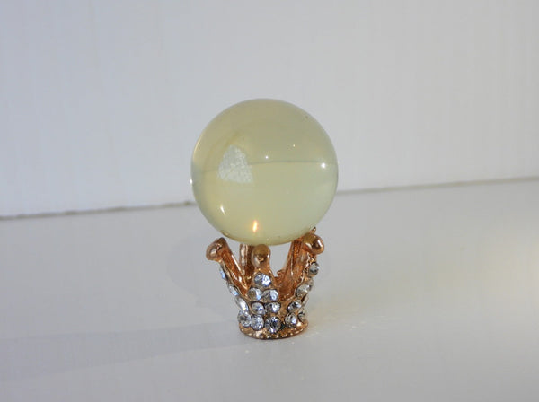 Star Citrine sphere on crown stand, 9g size